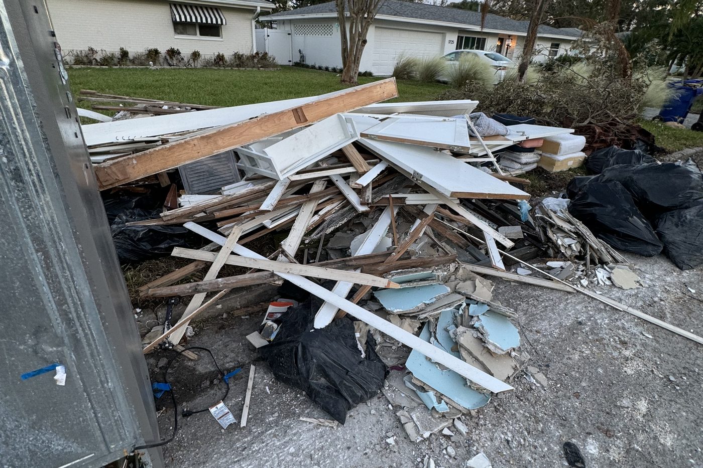 Unsalvageable drywall and flooring removed from a Central Florida home after water damage